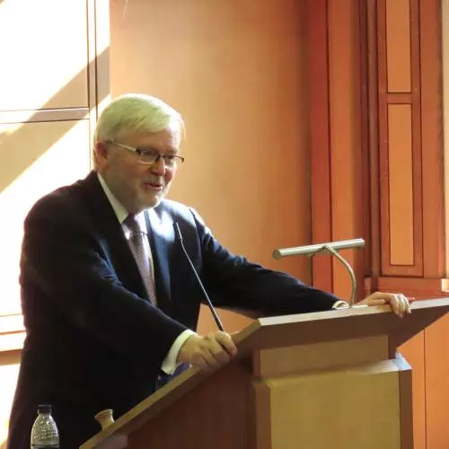 Ambassador Kevin Rudd at the OSGA 20th Anniversary event, standing at a speaker podium