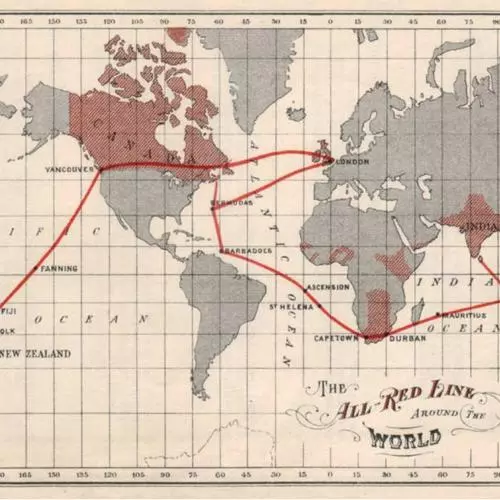 A world map showing the All Red Line linking Australia, New Zealand, Vancouver, London, Bermuda, Barbados, Cape Town, Durban, Cocos, Mauritius and Keeling Islands. The global territories of the British Empire are shaded red, the rest of the continents are shaded grey. 